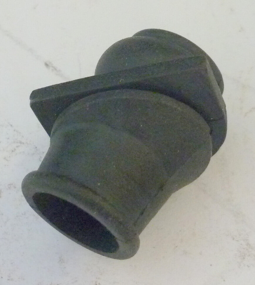 Grommet for petrol pipe trough air filter case