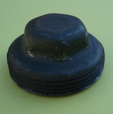 Plug for front wheel axle