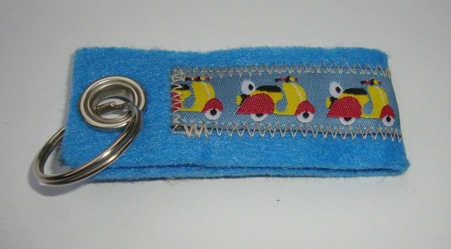 Key ring, felt, light blue, Vespa, coulerd