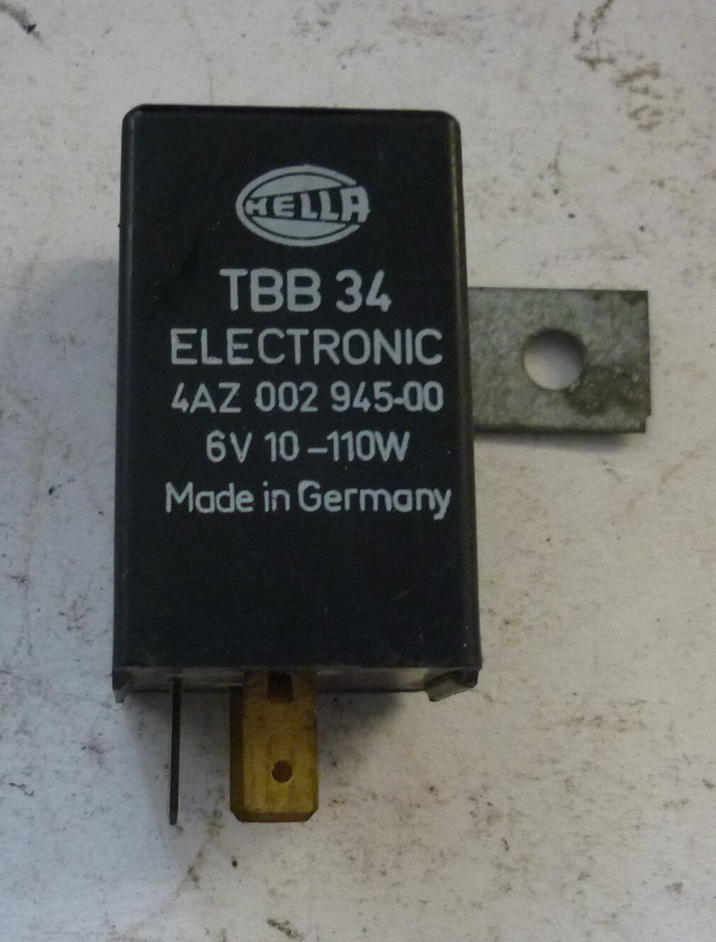 Electronic indicator relay with bracket, HELLA, TBB 34, Vespa P X80-200 /​ PE / ​Lusso /​ T5 /​ Cosa