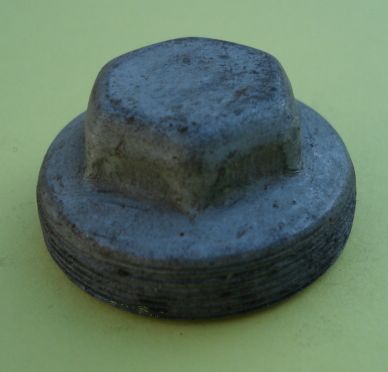 Plug for front wheel axle
